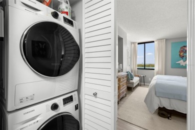 Welcome to an exquisite residence where elegance meets on Isla Del Sol Yacht and Country Club in Florida - for sale on GolfHomes.com, golf home, golf lot