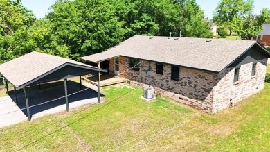 Beautifully updated 3 bedroom, 2 bathroom brick home located at on Sulphur Hills Golf Course in Oklahoma - for sale on GolfHomes.com, golf home, golf lot