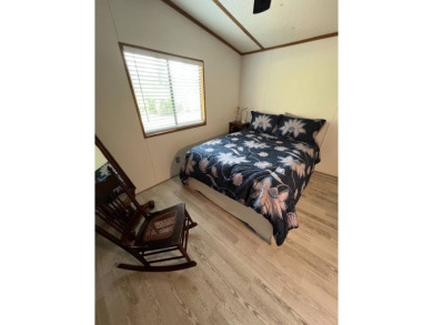 Charming 2 bed, 1.5 bath Home in 55+ Golf Community - New Roof on Lake Henry Golf Club in Florida - for sale on GolfHomes.com, golf home, golf lot
