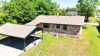 Beautifully updated 3 bedroom, 2 bathroom brick home located at on Sulphur Hills Golf Course in Oklahoma - for sale on GolfHomes.com, golf home, golf lot