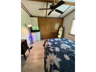 Charming 2 bed, 1.5 bath Home in 55+ Golf Community - New Roof on Lake Henry Golf Club in Florida - for sale on GolfHomes.com, golf home, golf lot