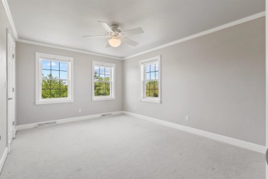 Step into timeless elegance with this stunning two-story on Dyersville Golf and Country Club in Iowa - for sale on GolfHomes.com, golf home, golf lot