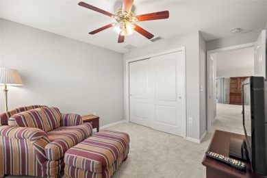 Under contract-accepting backup offers. A QUAINT MOVE-IN-READY on Tampa Bay Golf and Country Club in Florida - for sale on GolfHomes.com, golf home, golf lot