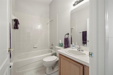 Under contract-accepting backup offers. A QUAINT MOVE-IN-READY on Tampa Bay Golf and Country Club in Florida - for sale on GolfHomes.com, golf home, golf lot