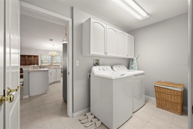 Under contract-accepting backup offers. A QUAINT MOVE-IN-READY on Tampa Bay Golf and Country Club in Florida - for sale on GolfHomes.com, golf home, golf lot