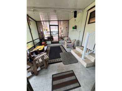 Charming 2 bed, 1.5 bath Home in 55+ Golf Community - New Roof on Lake Henry Golf Club in Florida - for sale on GolfHomes.com, golf home, golf lot