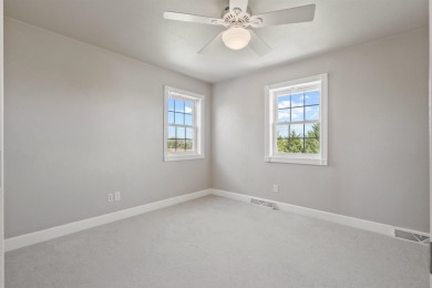 Step into timeless elegance with this stunning two-story on Dyersville Golf and Country Club in Iowa - for sale on GolfHomes.com, golf home, golf lot