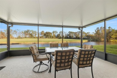 Under contract-accepting backup offers. A QUAINT MOVE-IN-READY on Tampa Bay Golf and Country Club in Florida - for sale on GolfHomes.com, golf home, golf lot