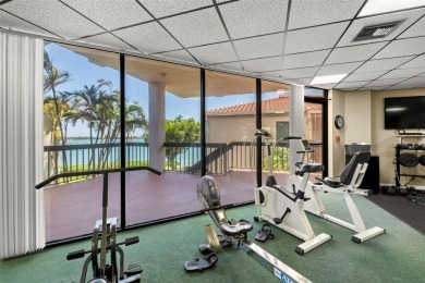 Welcome to an exquisite residence where elegance meets on Isla Del Sol Yacht and Country Club in Florida - for sale on GolfHomes.com, golf home, golf lot