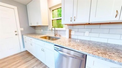 Beautifully updated 3 bedroom, 2 bathroom brick home located at on Sulphur Hills Golf Course in Oklahoma - for sale on GolfHomes.com, golf home, golf lot
