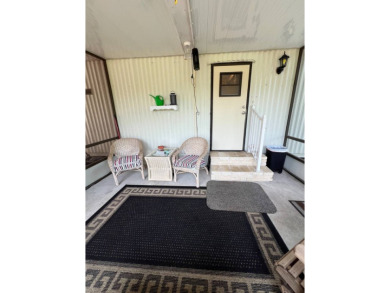 Charming 2 bed, 1.5 bath Home in 55+ Golf Community - New Roof on Lake Henry Golf Club in Florida - for sale on GolfHomes.com, golf home, golf lot