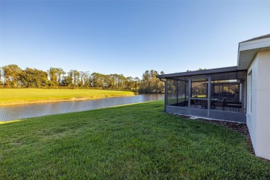 Under contract-accepting backup offers. A QUAINT MOVE-IN-READY on Tampa Bay Golf and Country Club in Florida - for sale on GolfHomes.com, golf home, golf lot
