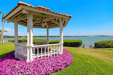 Welcome to an exquisite residence where elegance meets on Isla Del Sol Yacht and Country Club in Florida - for sale on GolfHomes.com, golf home, golf lot