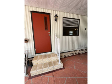 Charming 2 bed, 1.5 bath Home in 55+ Golf Community - New Roof on Lake Henry Golf Club in Florida - for sale on GolfHomes.com, golf home, golf lot