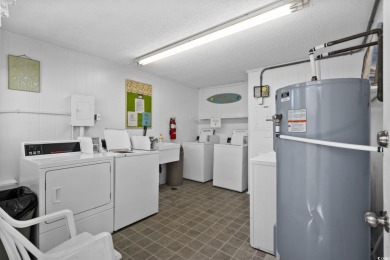 A SHORT STROLL TO THE BEACH, WATER VIEWS, METICULOUSLY on Surf Golf and Beach Club in South Carolina - for sale on GolfHomes.com, golf home, golf lot