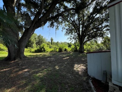Charming 2 bed, 1.5 bath Home in 55+ Golf Community - New Roof on Lake Henry Golf Club in Florida - for sale on GolfHomes.com, golf home, golf lot