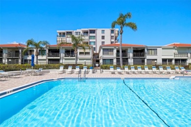 Welcome to an exquisite residence where elegance meets on Isla Del Sol Yacht and Country Club in Florida - for sale on GolfHomes.com, golf home, golf lot