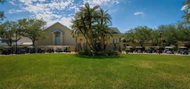 Under contract-accepting backup offers. A QUAINT MOVE-IN-READY on Tampa Bay Golf and Country Club in Florida - for sale on GolfHomes.com, golf home, golf lot
