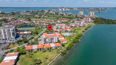 Welcome to an exquisite residence where elegance meets on Isla Del Sol Yacht and Country Club in Florida - for sale on GolfHomes.com, golf home, golf lot