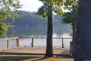 Love lake life? This freshly painted and transformed home is on DeSoto Golf Course in Arkansas - for sale on GolfHomes.com, golf home, golf lot