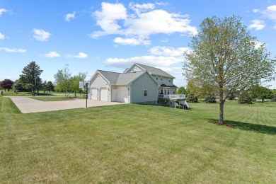 Step into timeless elegance with this stunning two-story on Dyersville Golf and Country Club in Iowa - for sale on GolfHomes.com, golf home, golf lot