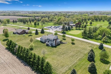 Step into timeless elegance with this stunning two-story on Dyersville Golf and Country Club in Iowa - for sale on GolfHomes.com, golf home, golf lot