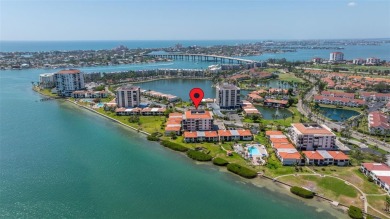 Welcome to an exquisite residence where elegance meets on Isla Del Sol Yacht and Country Club in Florida - for sale on GolfHomes.com, golf home, golf lot