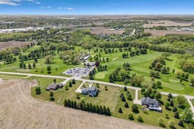 Step into timeless elegance with this stunning two-story on Dyersville Golf and Country Club in Iowa - for sale on GolfHomes.com, golf home, golf lot