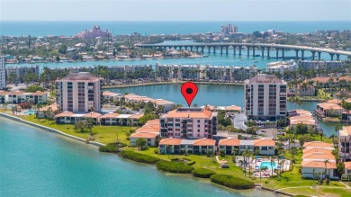 Welcome to an exquisite residence where elegance meets on Isla Del Sol Yacht and Country Club in Florida - for sale on GolfHomes.com, golf home, golf lot