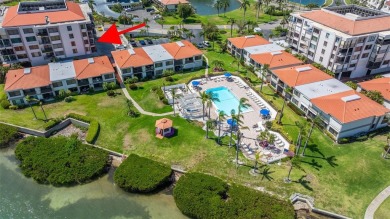 Welcome to an exquisite residence where elegance meets on Isla Del Sol Yacht and Country Club in Florida - for sale on GolfHomes.com, golf home, golf lot