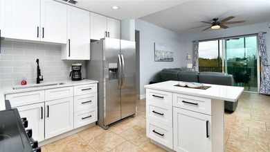 The Minute you Step Inside this Harbor Tower Unit  - You will on Burnt Store Golf Club in Florida - for sale on GolfHomes.com, golf home, golf lot