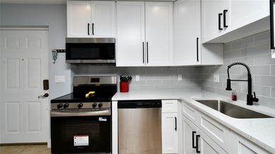 The Minute you Step Inside this Harbor Tower Unit  - You will on Burnt Store Golf Club in Florida - for sale on GolfHomes.com, golf home, golf lot