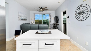 The Minute you Step Inside this Harbor Tower Unit  - You will on Burnt Store Golf Club in Florida - for sale on GolfHomes.com, golf home, golf lot