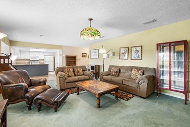 Is this FURNISHED 2-bed, 2-bath condo in the active and engaging on Falcon Watch Golf Club in Florida - for sale on GolfHomes.com, golf home, golf lot