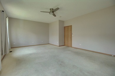 This description highlights a spacious Carmel model home on The Links at Carillon in Illinois - for sale on GolfHomes.com, golf home, golf lot