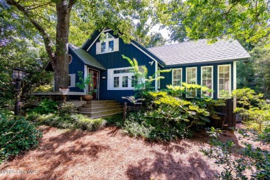 Nestled in the maritime forest of Pine Knoll Shores, this island on The Country Club of the Crystal Coast in North Carolina - for sale on GolfHomes.com, golf home, golf lot