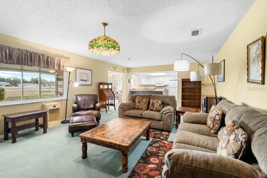Is this FURNISHED 2-bed, 2-bath condo in the active and engaging on Falcon Watch Golf Club in Florida - for sale on GolfHomes.com, golf home, golf lot