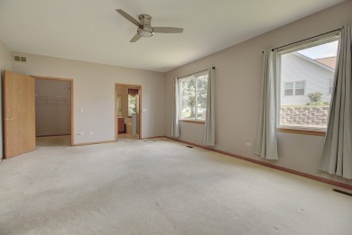 This description highlights a spacious Carmel model home on The Links at Carillon in Illinois - for sale on GolfHomes.com, golf home, golf lot