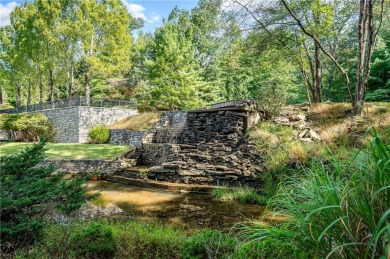 Unique opportunity to own a modern stone castle in a park-like on Buhl Farm Golf Course in Pennsylvania - for sale on GolfHomes.com, golf home, golf lot