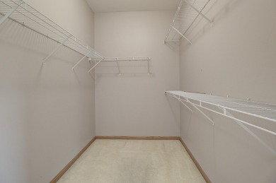This description highlights a spacious Carmel model home on The Links at Carillon in Illinois - for sale on GolfHomes.com, golf home, golf lot