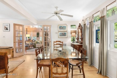 Nestled in the maritime forest of Pine Knoll Shores, this island on The Country Club of the Crystal Coast in North Carolina - for sale on GolfHomes.com, golf home, golf lot