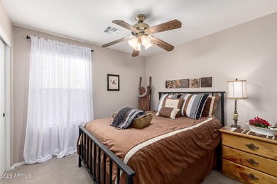 Immaculately maintained 4-bedroom, 2-bath home shows pride of on The Golf Club At Johnson Ranch in Arizona - for sale on GolfHomes.com, golf home, golf lot