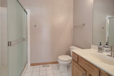 This description highlights a spacious Carmel model home on The Links at Carillon in Illinois - for sale on GolfHomes.com, golf home, golf lot