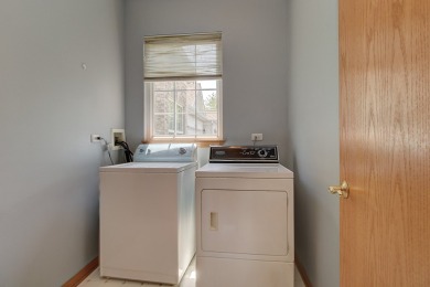 This description highlights a spacious Carmel model home on The Links at Carillon in Illinois - for sale on GolfHomes.com, golf home, golf lot