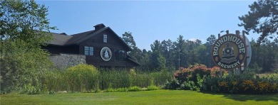 Let someone else take care of the yard work so you can relax in on The Pines At Grand View Lodge Golf Club in Minnesota - for sale on GolfHomes.com, golf home, golf lot