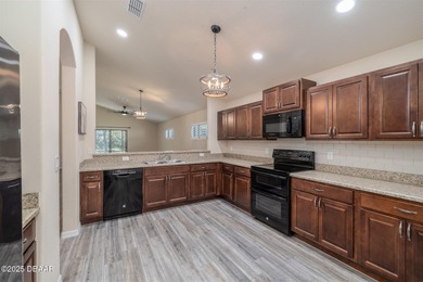 Location! Location! This immaculate 3-bedroom, 2-bath home is on Halifax Plantation Golf Club in Florida - for sale on GolfHomes.com, golf home, golf lot