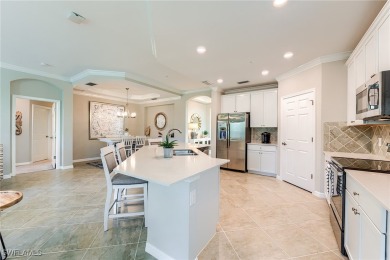 Lowest priced first floor carriage home in Casella with a unique on Pelican Preserve Golf Club in Florida - for sale on GolfHomes.com, golf home, golf lot