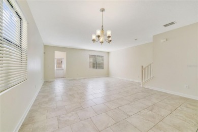 This charming 3-bedroom, 2.5-bathroom single-family home offers on Orange County National Golf Center and Lodge in Florida - for sale on GolfHomes.com, golf home, golf lot