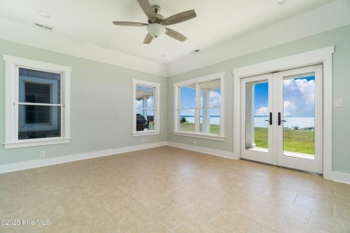 Riverfront Retreat with Five-Mile Neuse Views. Wake up to on Minnesott Golf and Country Club in North Carolina - for sale on GolfHomes.com, golf home, golf lot
