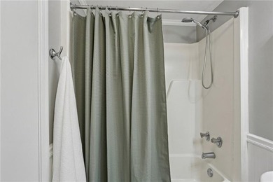 Experience elevated city living in this stunning one-bedroom on Bobby Jones Golf Club in Georgia - for sale on GolfHomes.com, golf home, golf lot